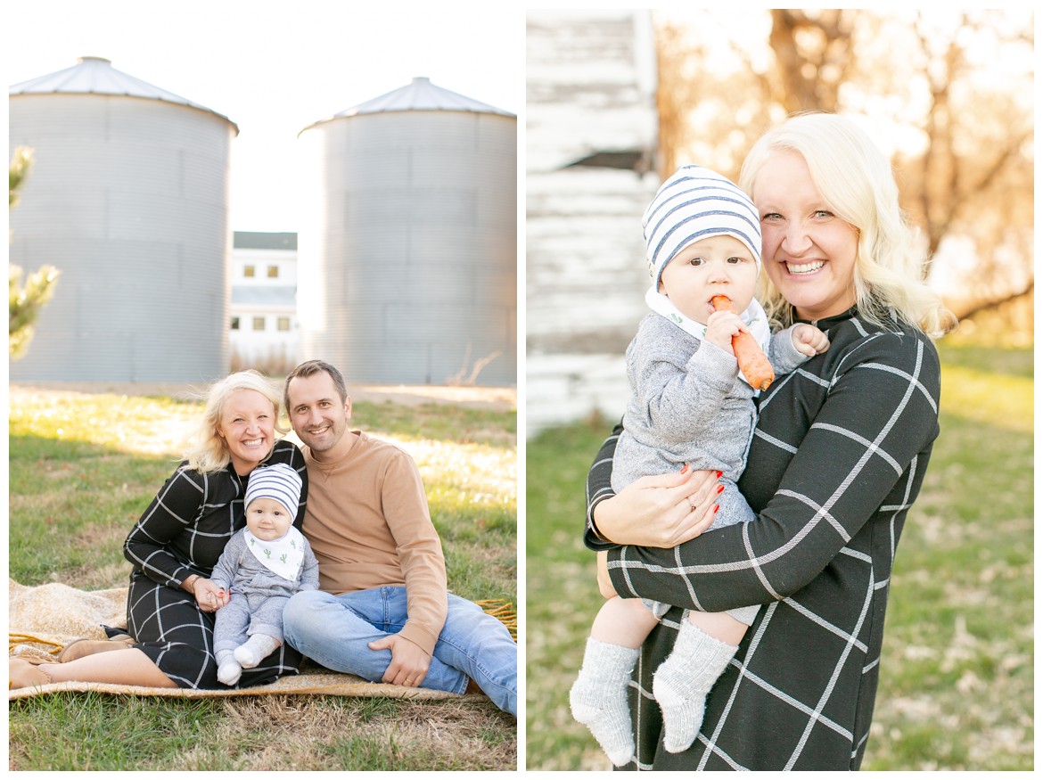 man woman baby in front of Gathered Oaks silos
